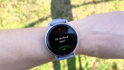 Garmin Vivoactive 5 on wrist with message "do workout now?"
